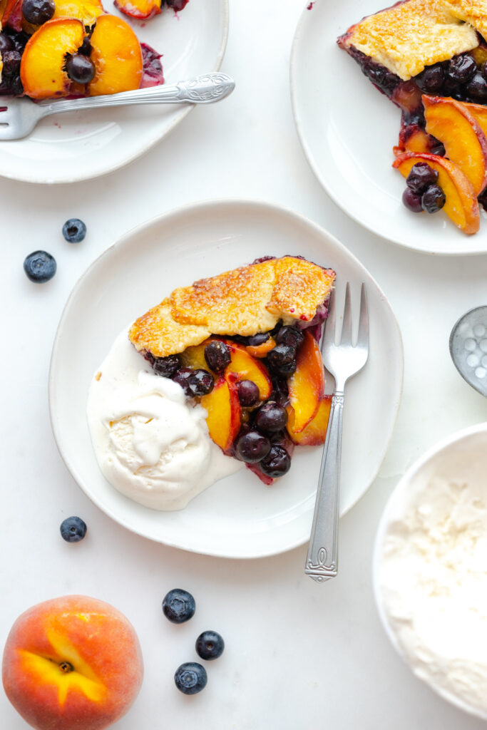 Blueberry Peach Galette slice with ice cream