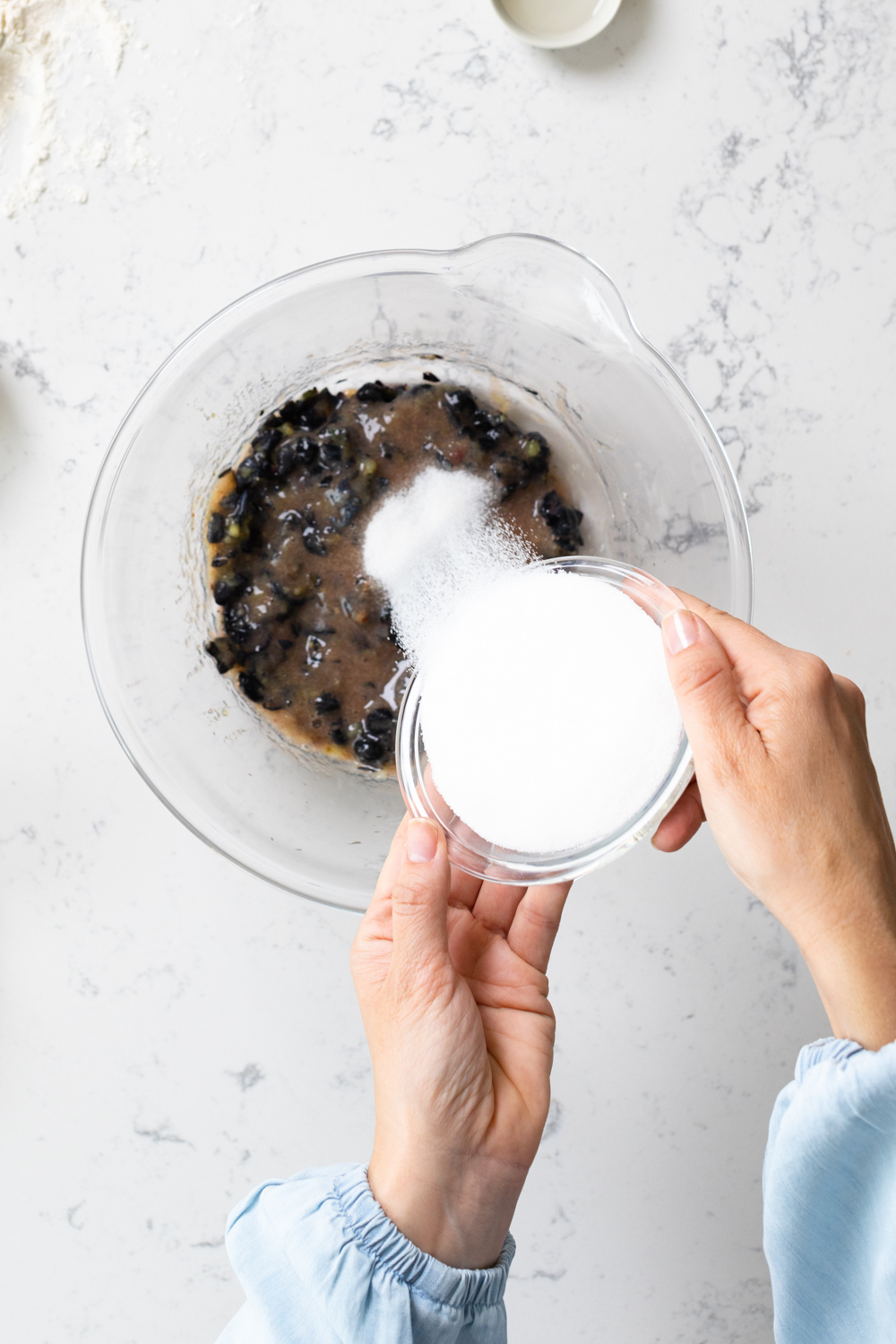 Mixing blueberry pie filling