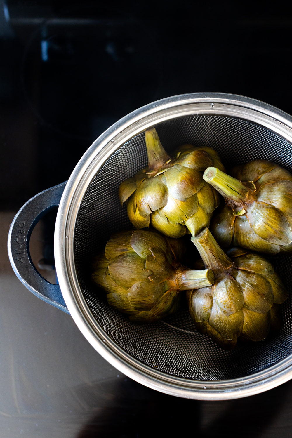 steaming artichokes