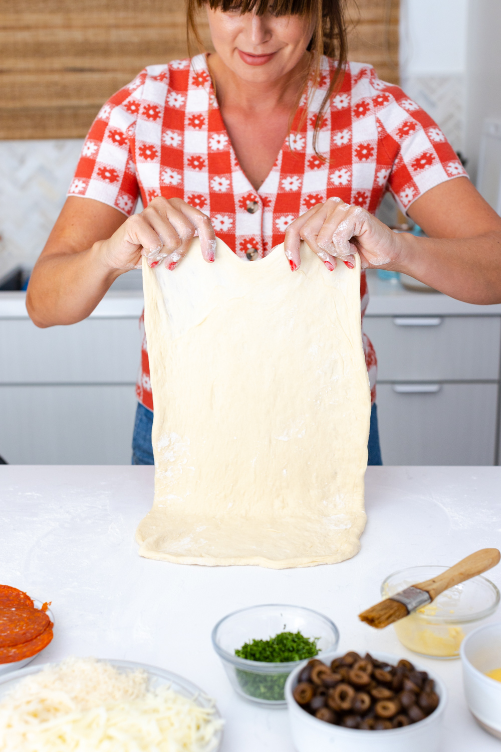 stretching Stromboli dough