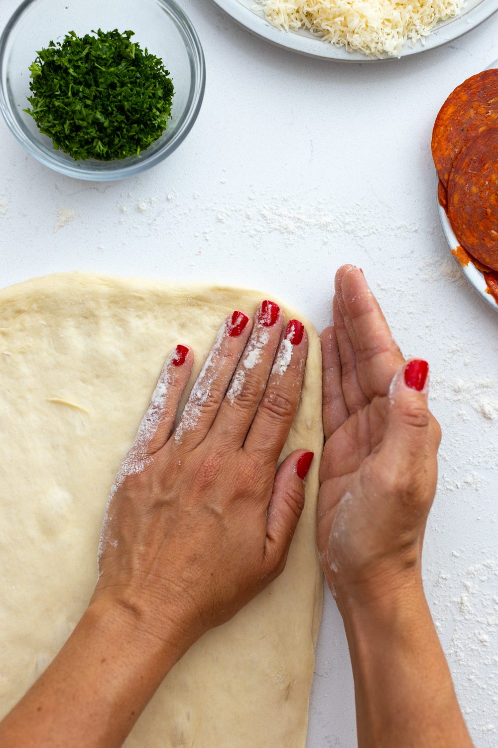 Shaping Stromobli pizza dough