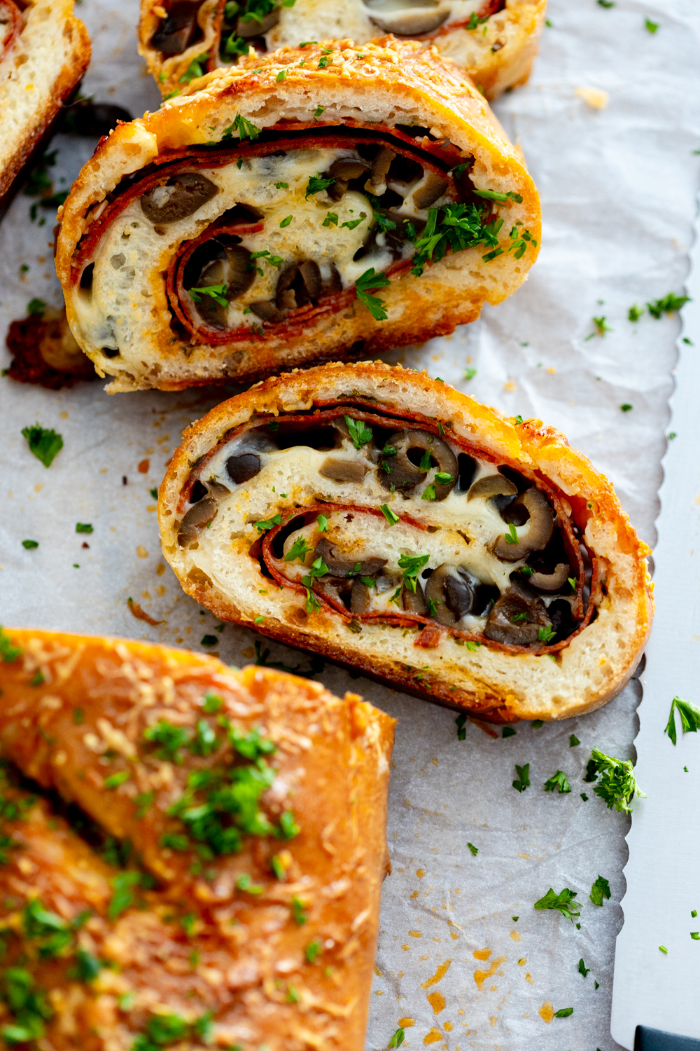 Slices of Pepperoni Black Olive Stromboli