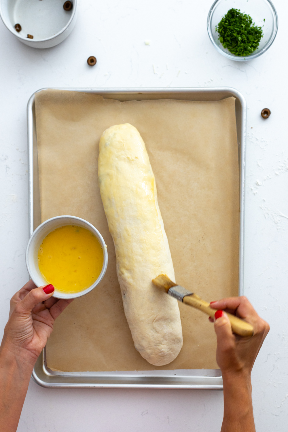Egg wash on Stromboli