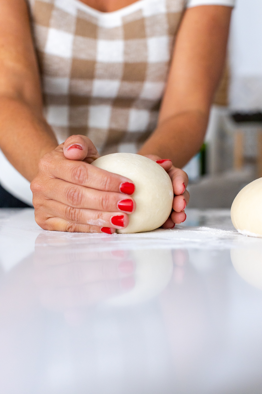 shaping pizza dough boule