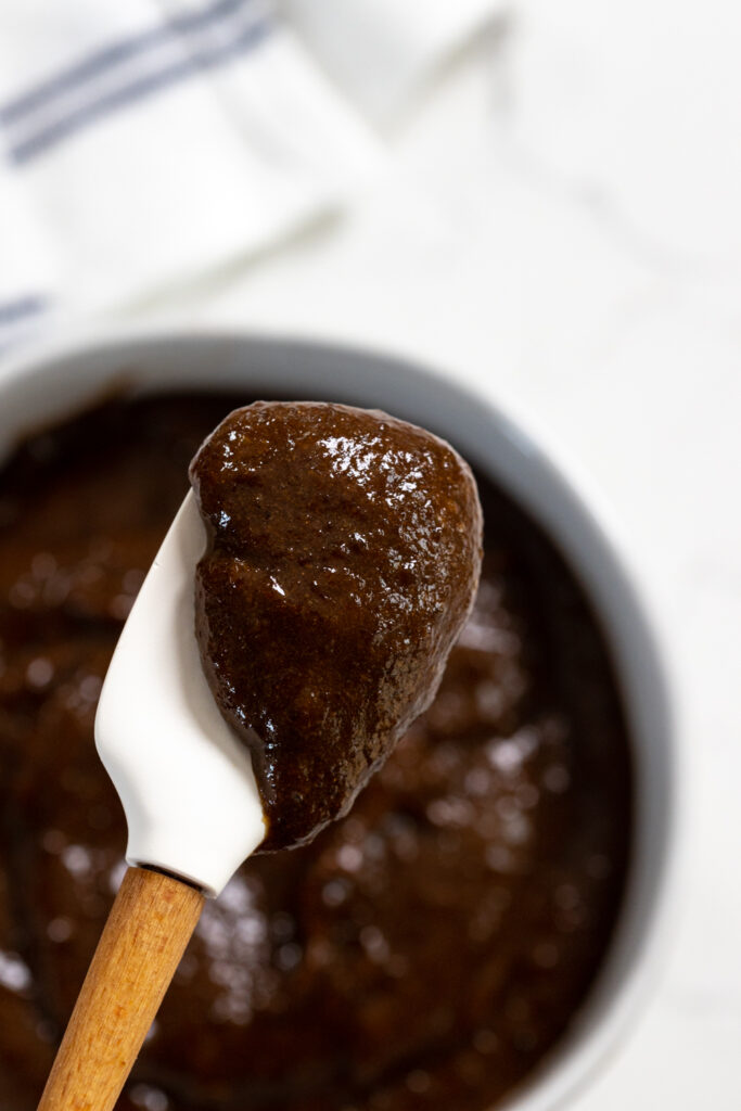 velvety prune puree on a spoon