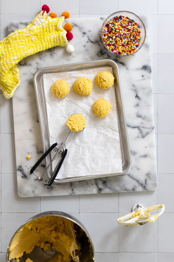 Scooping Lemon Rainbow Sprinkle Cookie dough