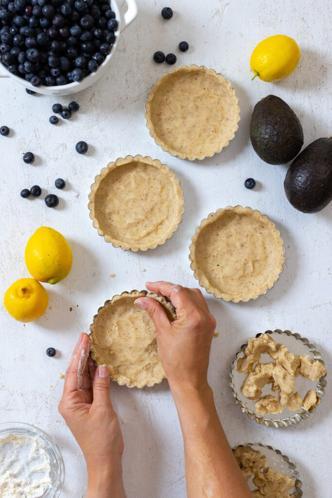 Pressing in almond shortbread tart shell