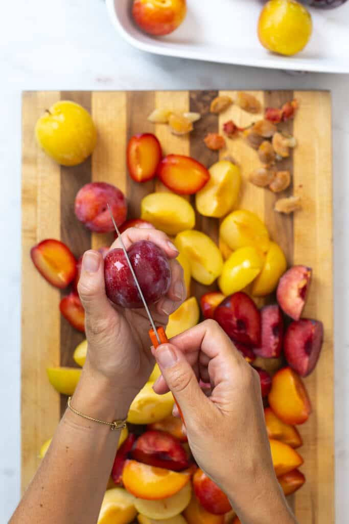 slicing plums
