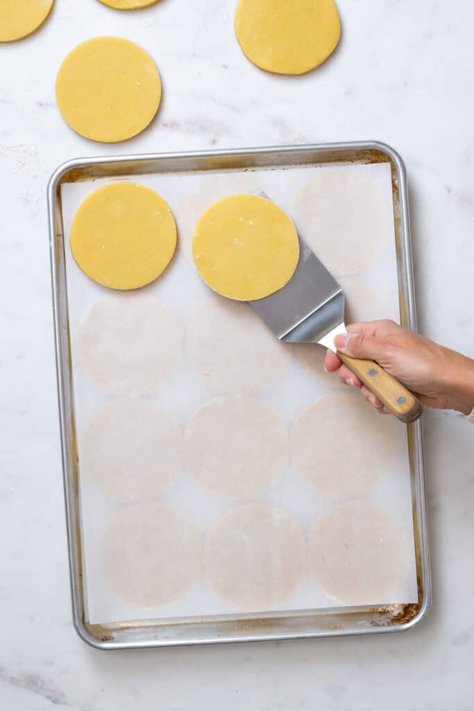 stacking cookie dough rounds for chilling