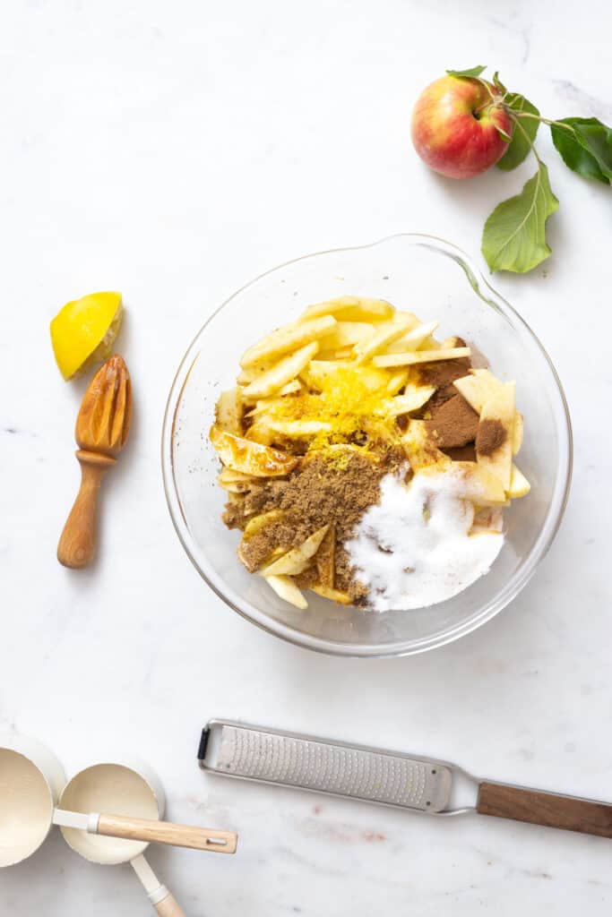 Apple pie filling ingredients in bowl
