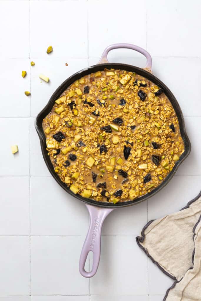 Baked Prune Apple Oatmeal mix in skillet