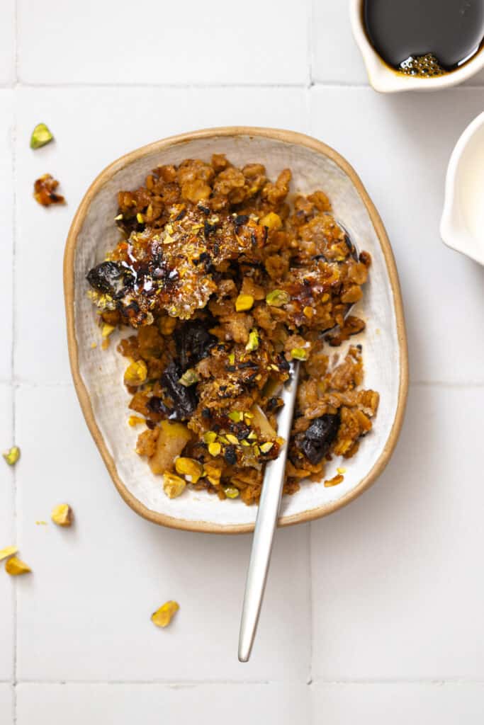 Bowl of Baked Prune Apple Oatmeal Brûlée