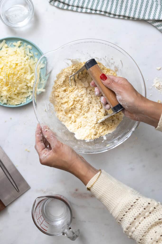 cut the butter into the dough with pastry blender