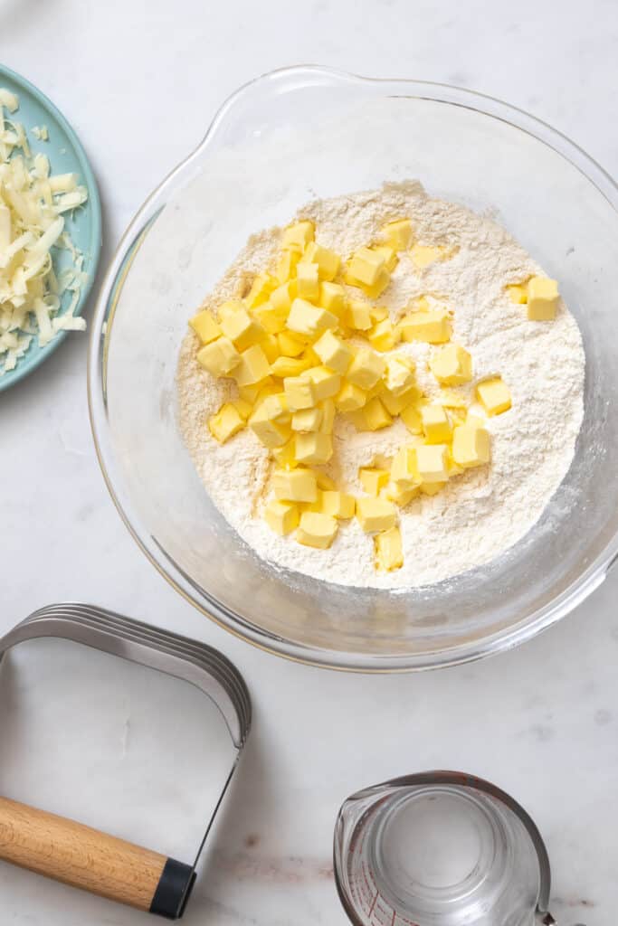 adding cold, cubed butter