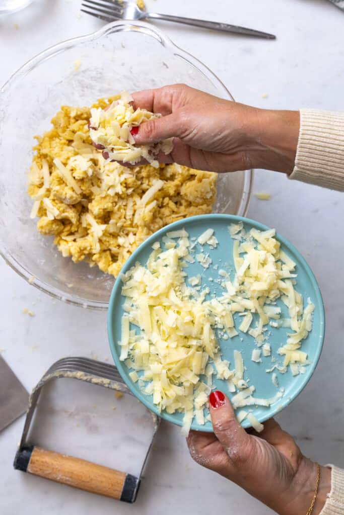 adding cheddar to dough