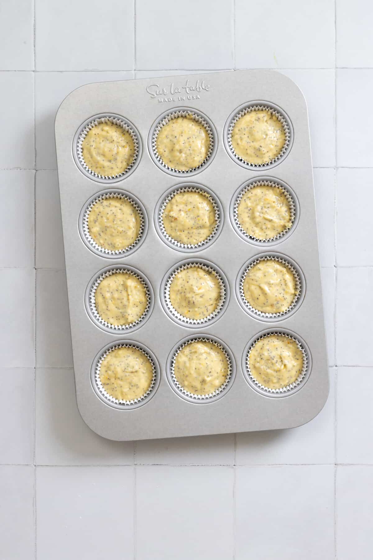 muffin tin with batter