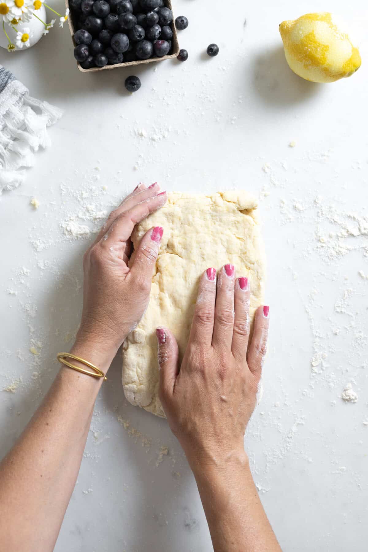 patting shortcake dough