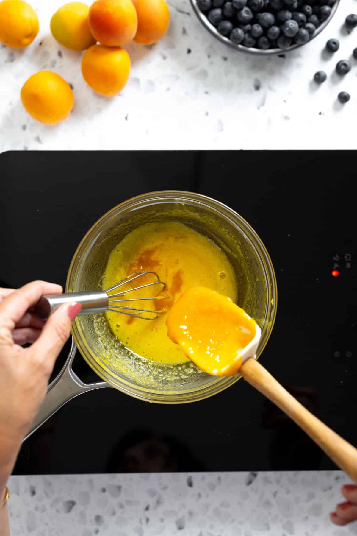 adding apricots to double boiler