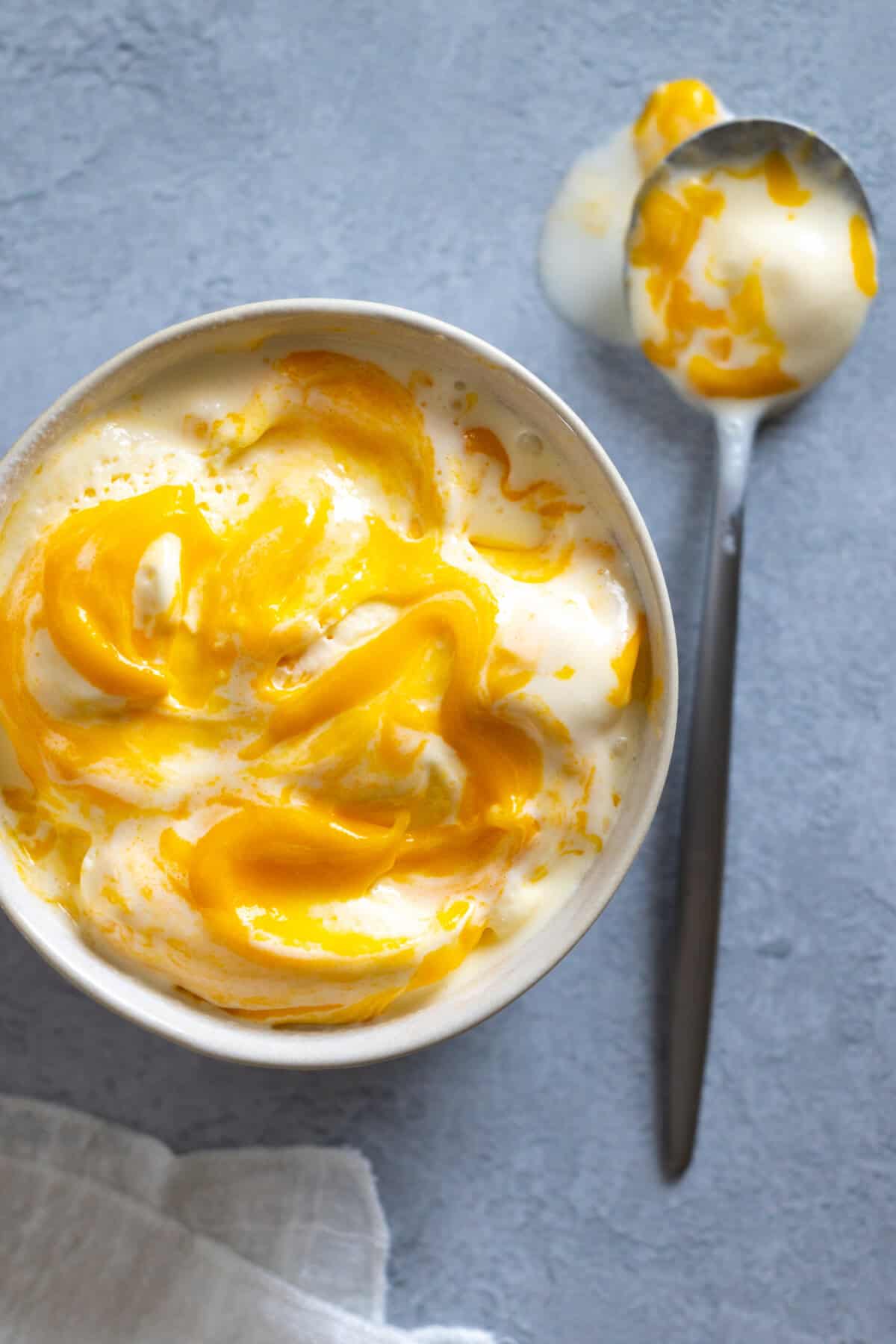 Vanilla Ice Cream with swirls of Apricot Curd