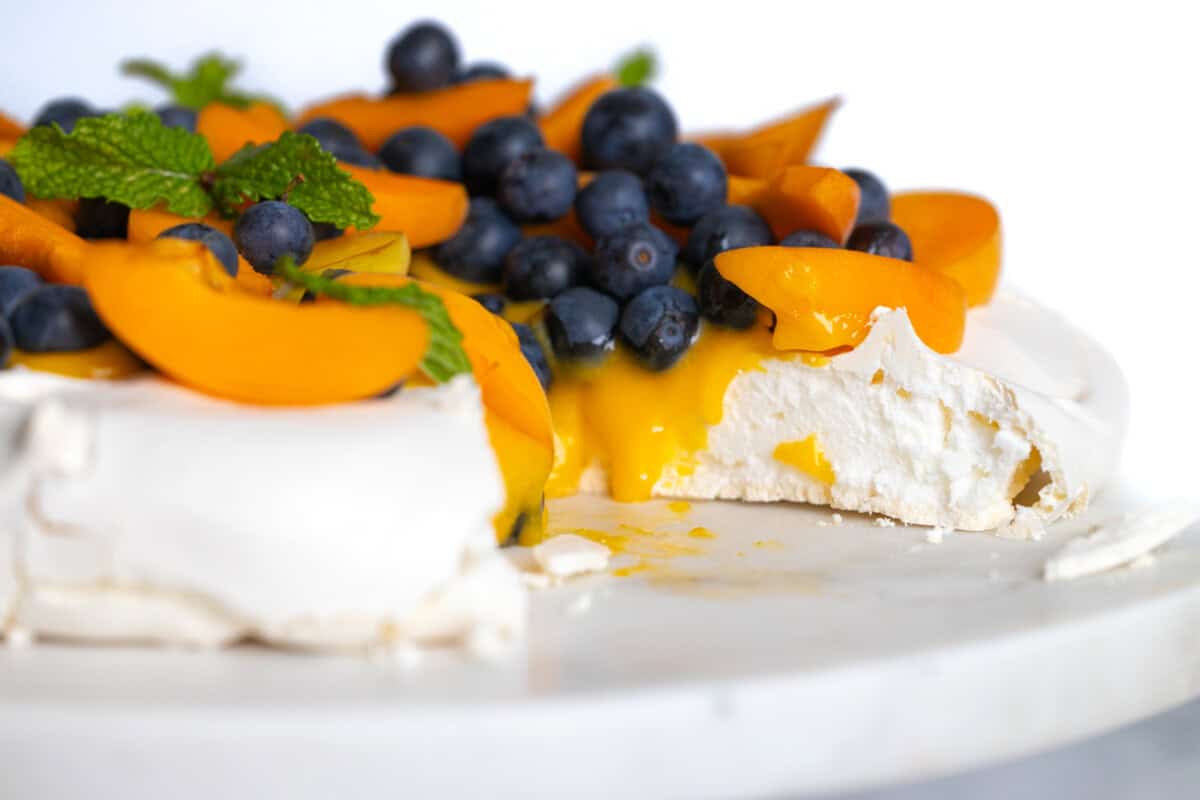 Sliced Apricot Curd and Blueberry Pavlova
