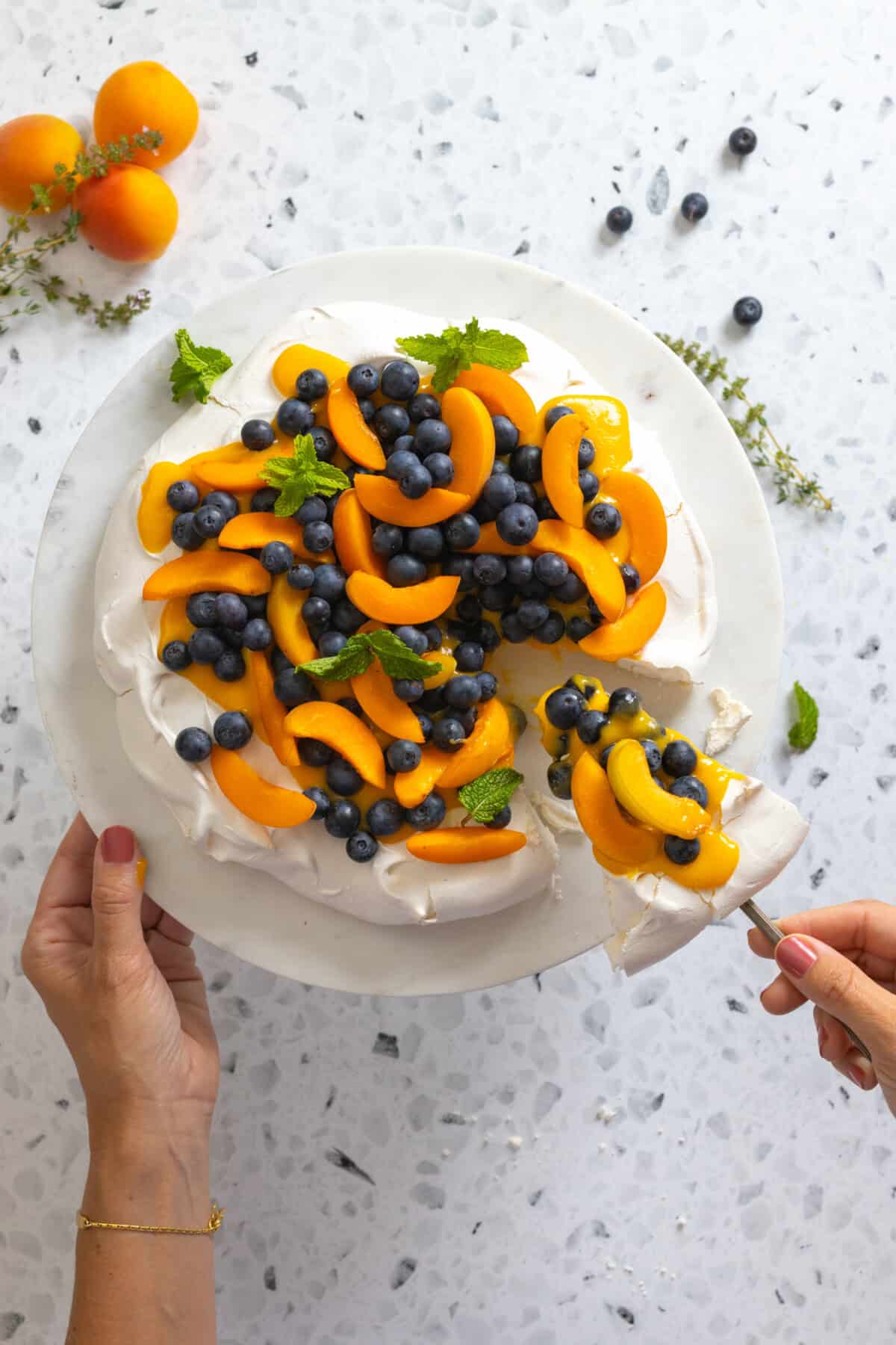 Slice of Pavlova with Apricot Curd and Blueberries