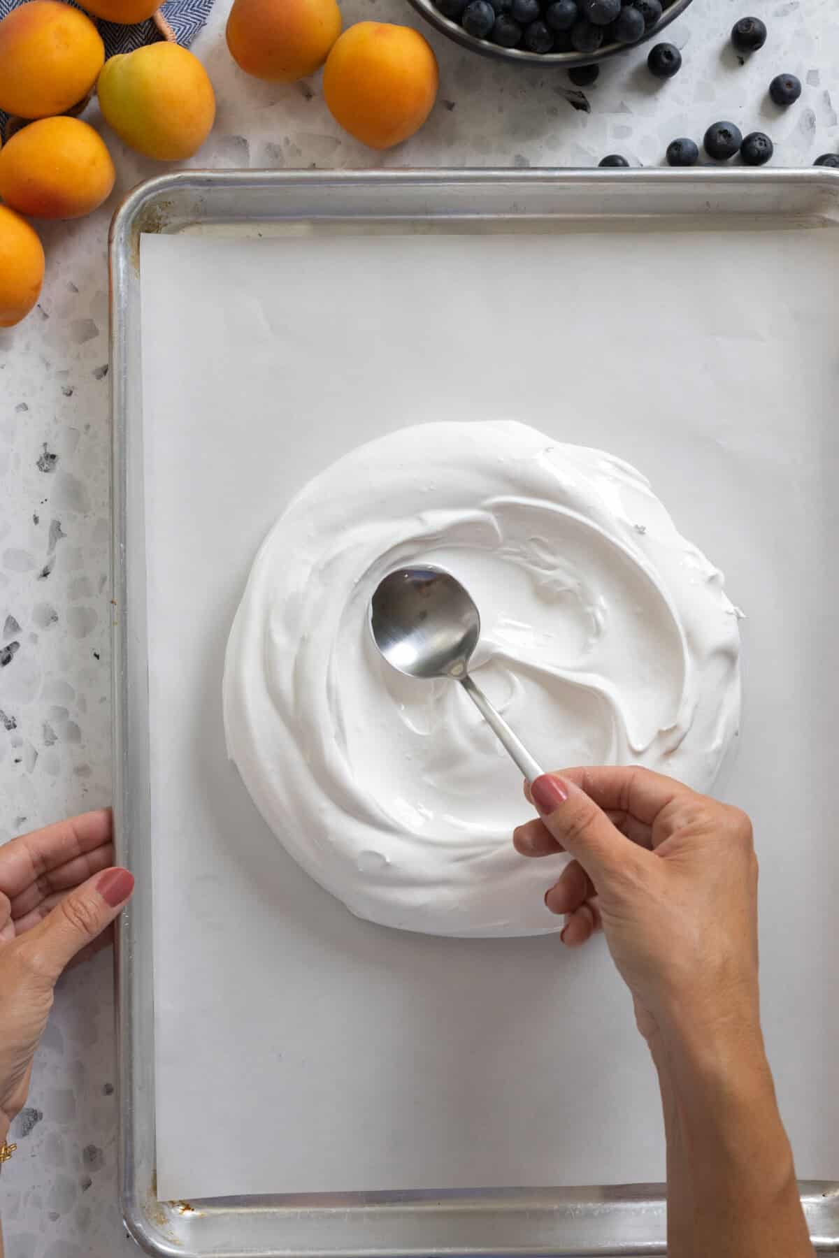 Spreading meringue into round shape