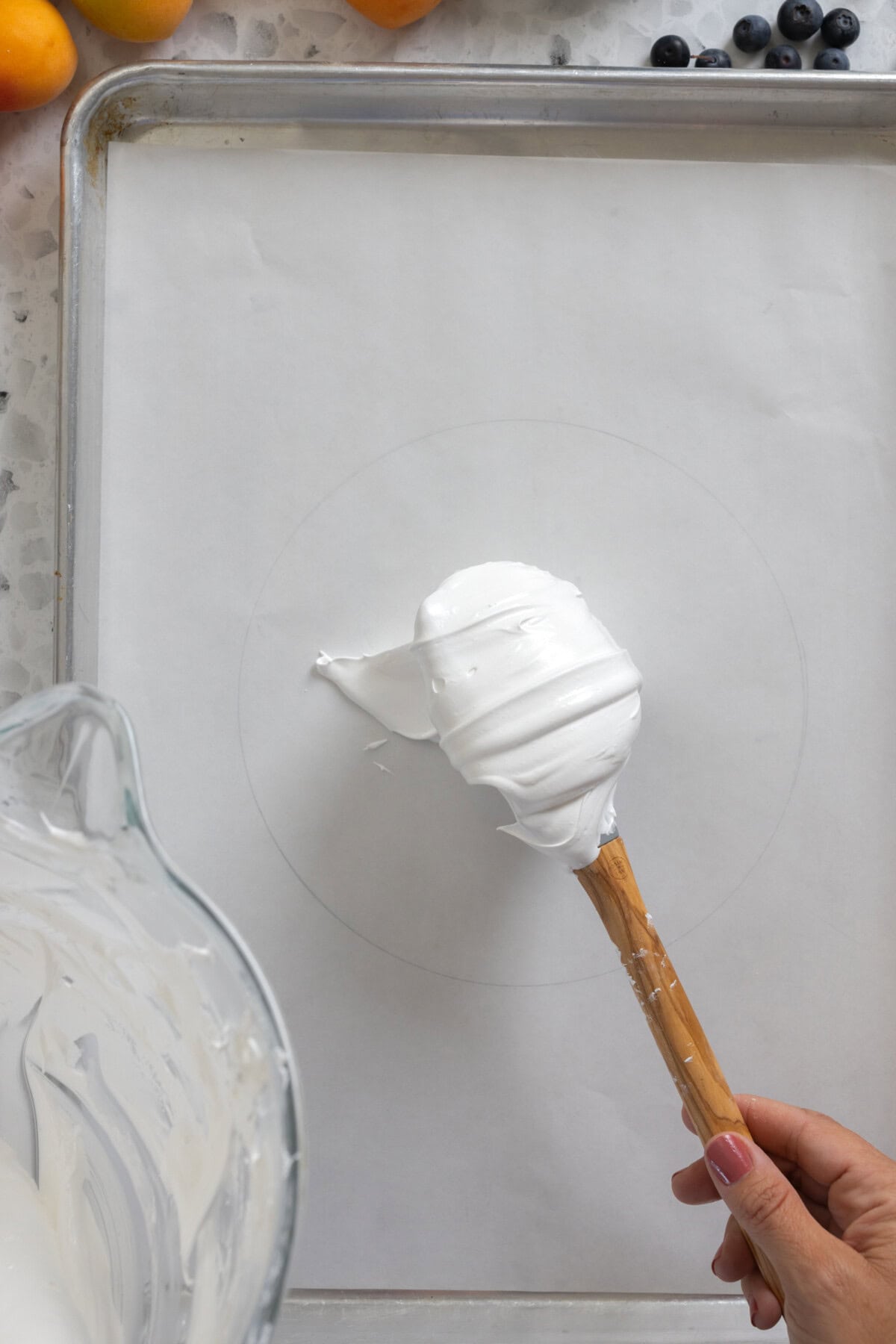 transfer the meringue to a parchment lined baking sheet