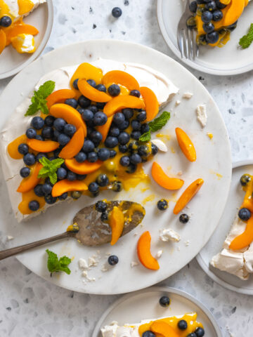 Pavlova with Apricot Curd and Blueberries by Baking The Goods