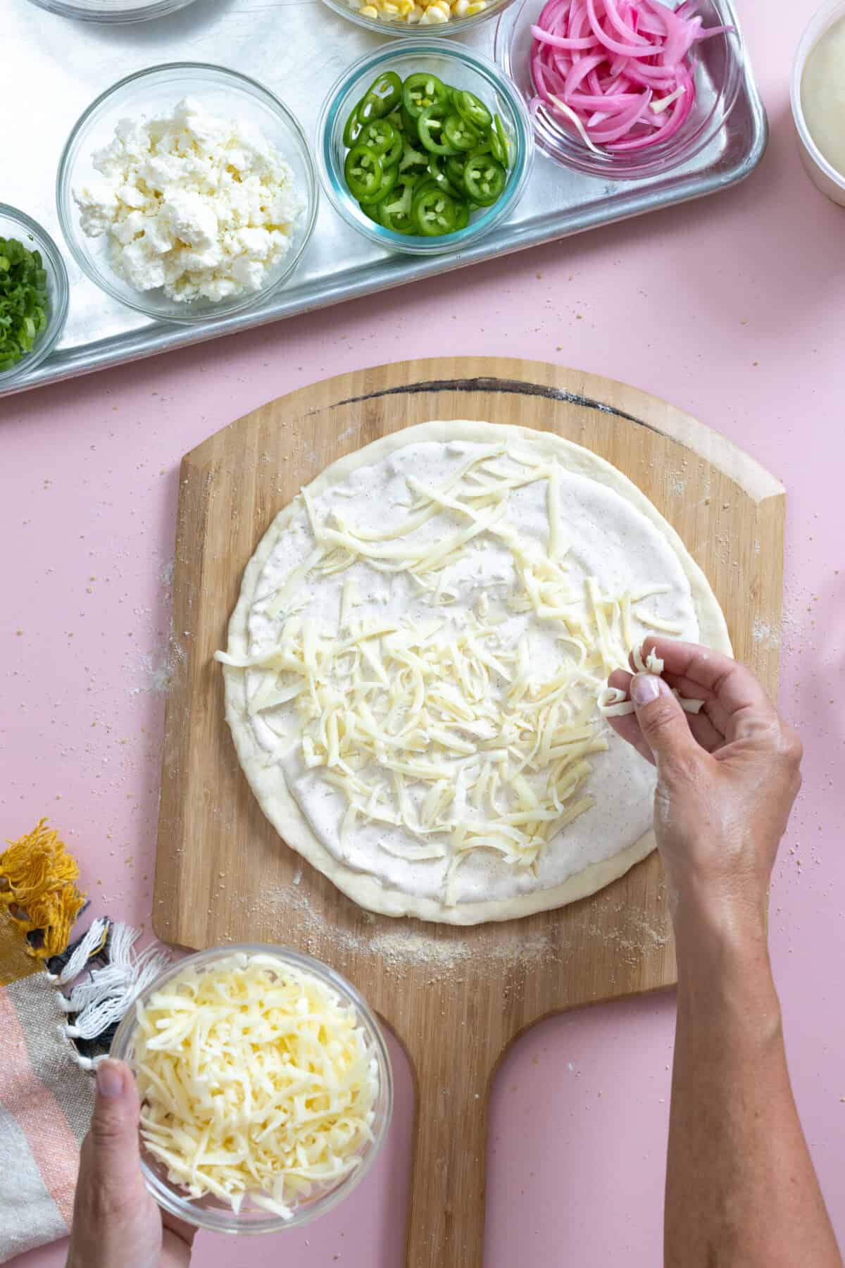 Top pizza with mozzarella