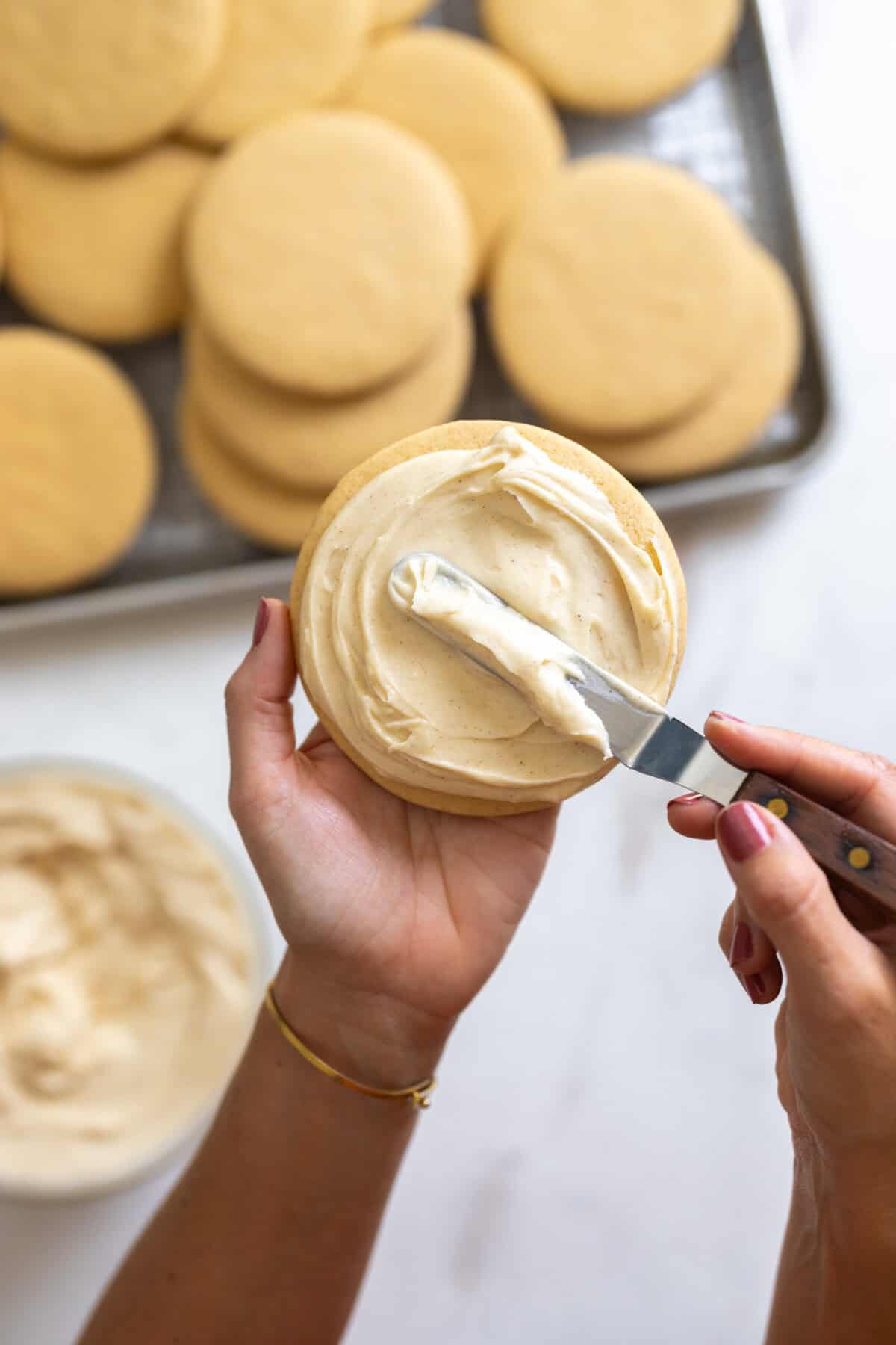 Frosting the Big Maple Cream Cheese Frosted Cookies