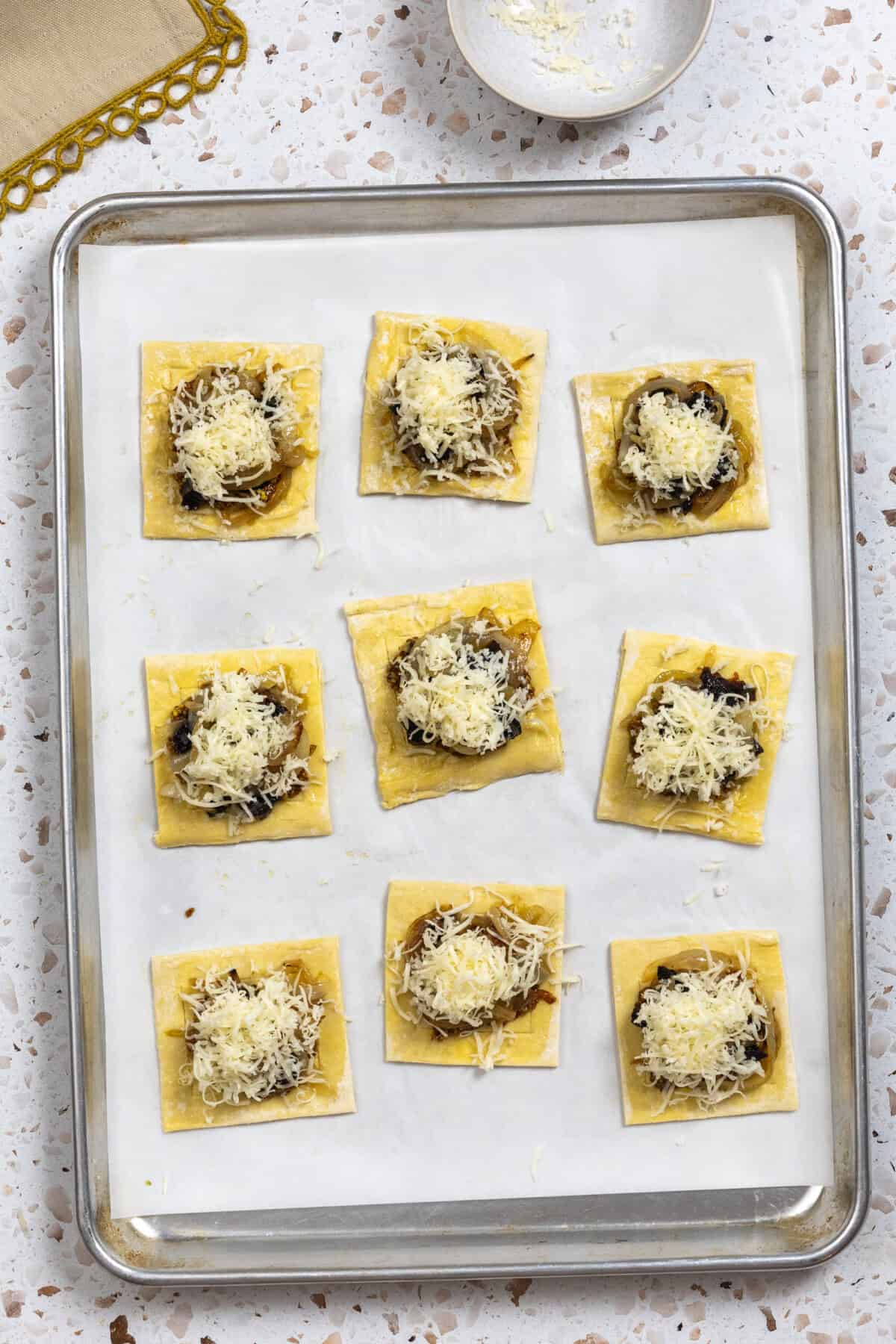 Prune Onion Fontina Tarts - pre-baked on a sheet pan