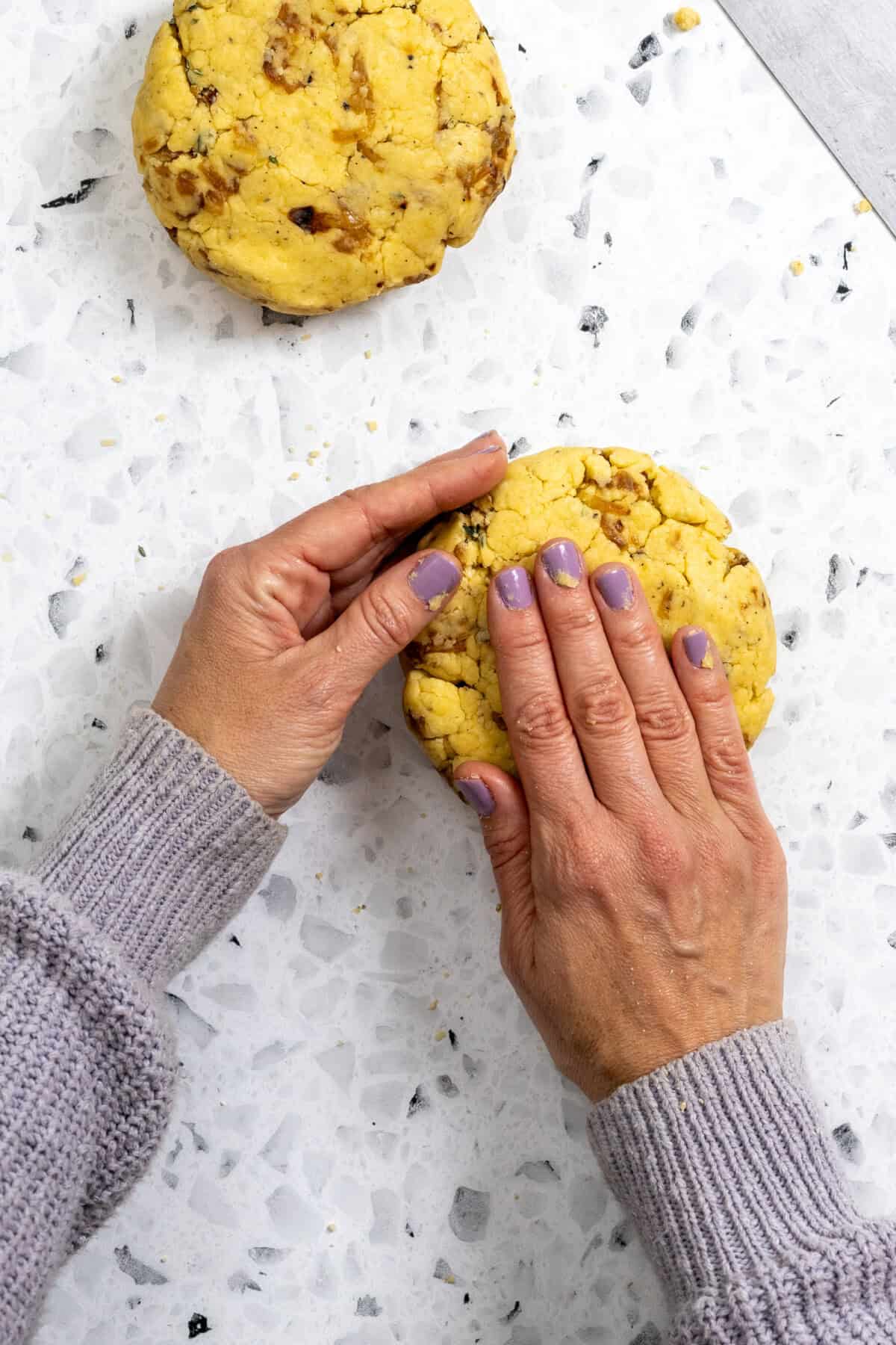 shaping the scone dough into disks