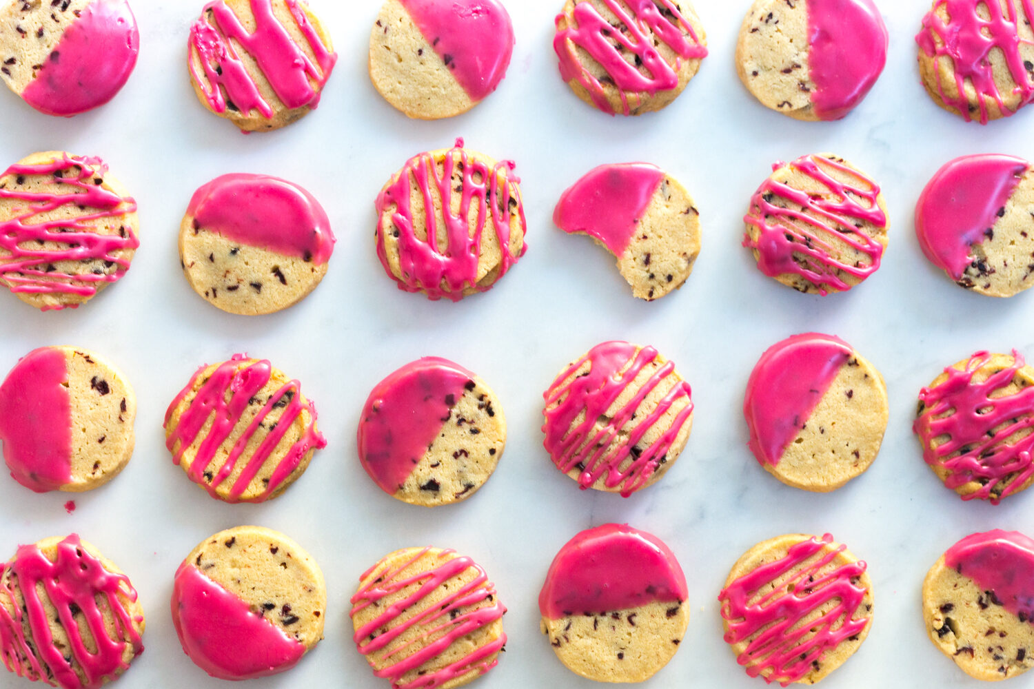 Rows of Glazed Hibiscus Shortbread Cookies