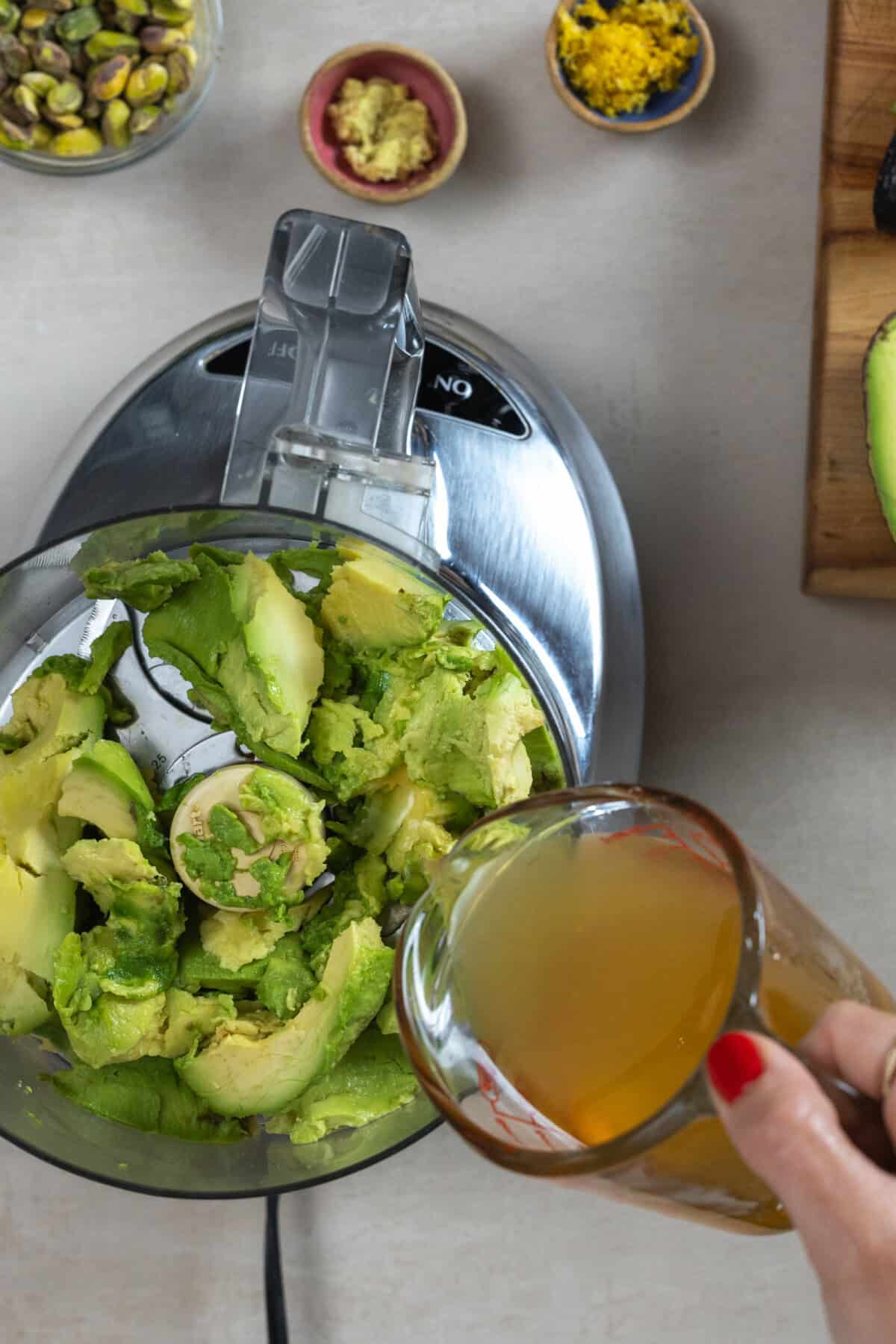 Honey Citrus Avocado Dip ingredients in food processor