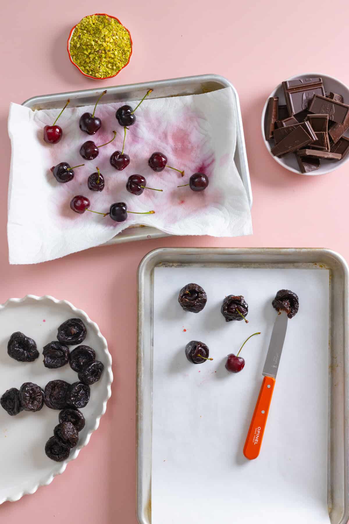 slicing prunes to stuff with cherries