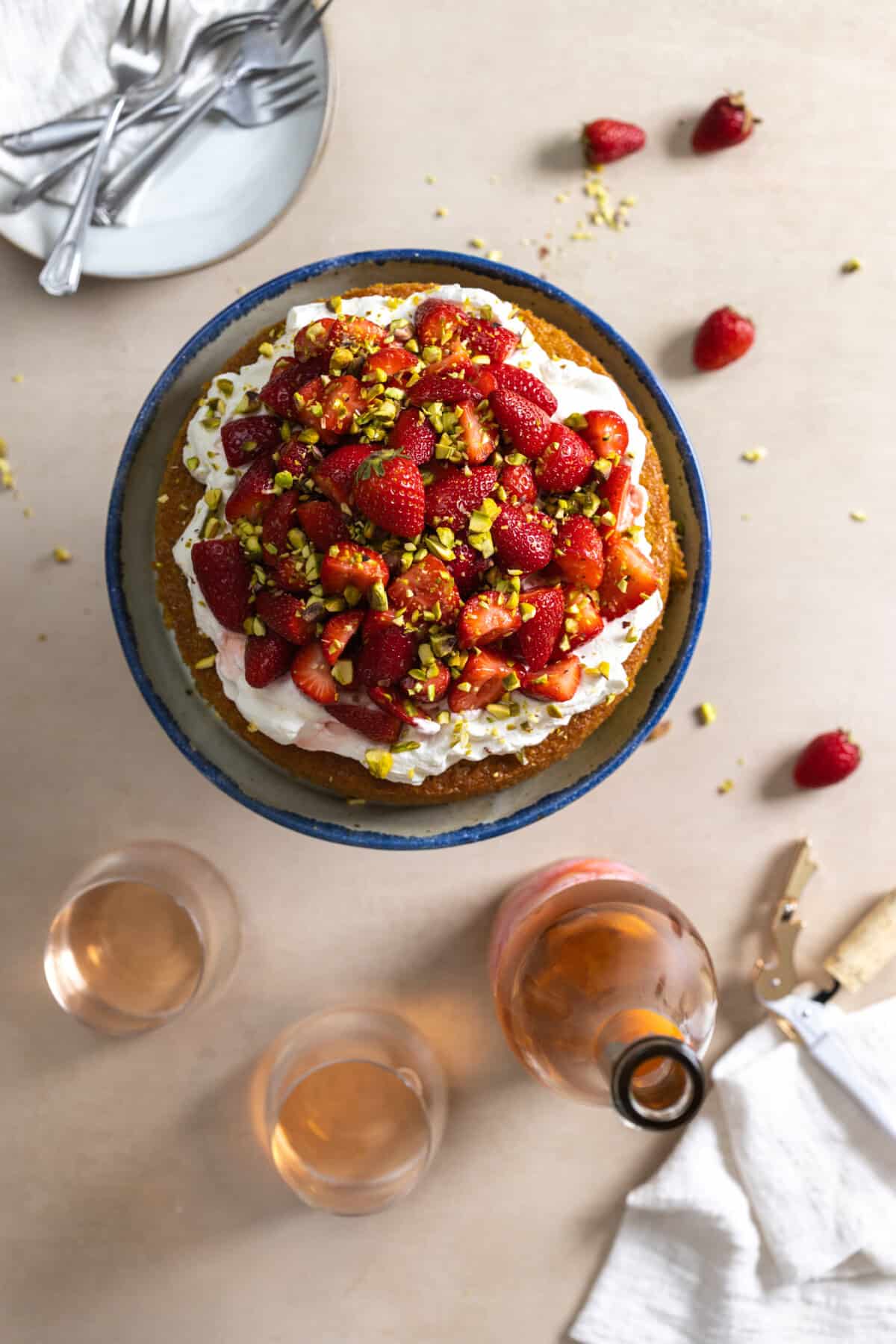 Strawberry Pistachio Olive Oil Cake with rosé wine