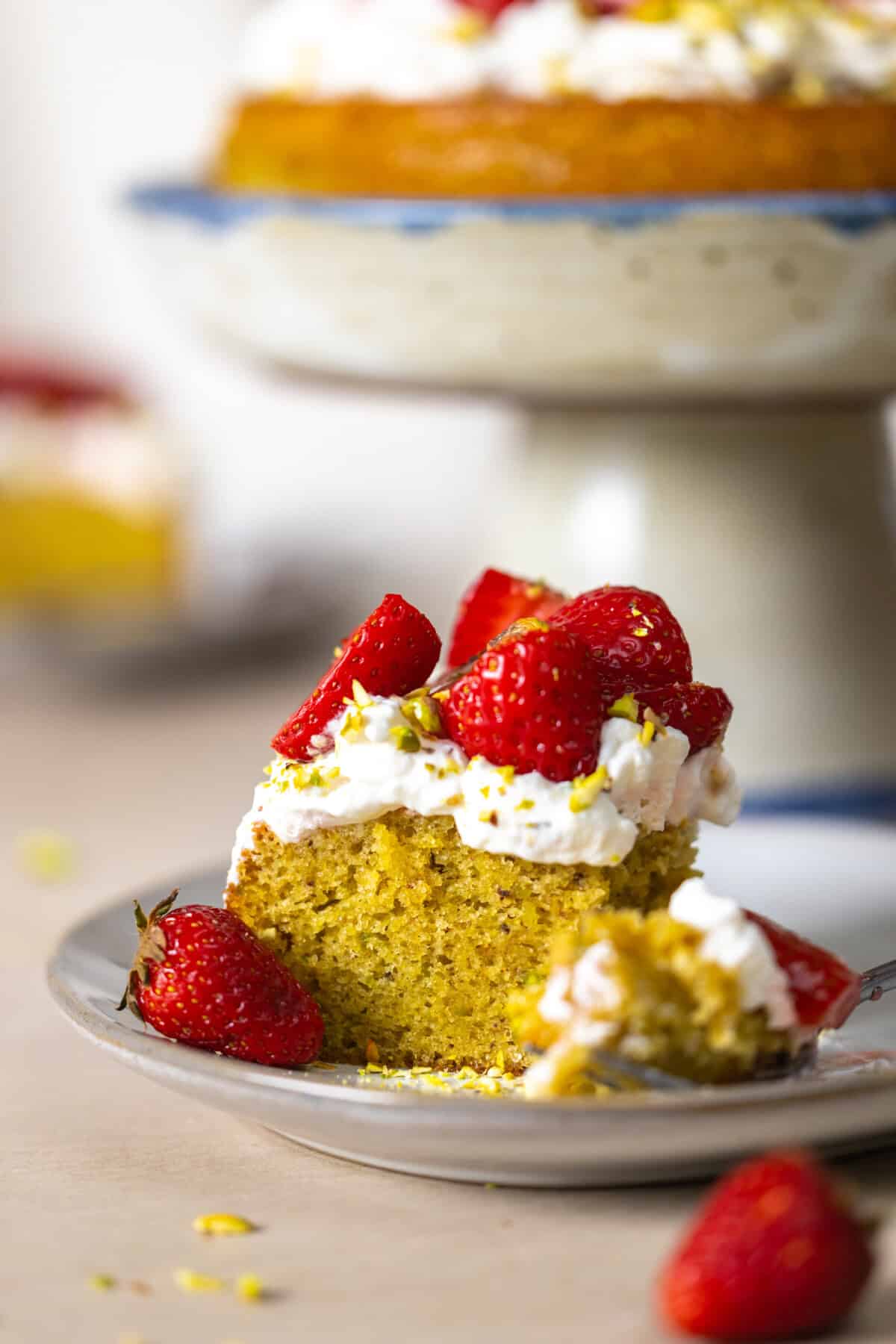 Slice of Strawberry Pistachio Olive Oil Cake