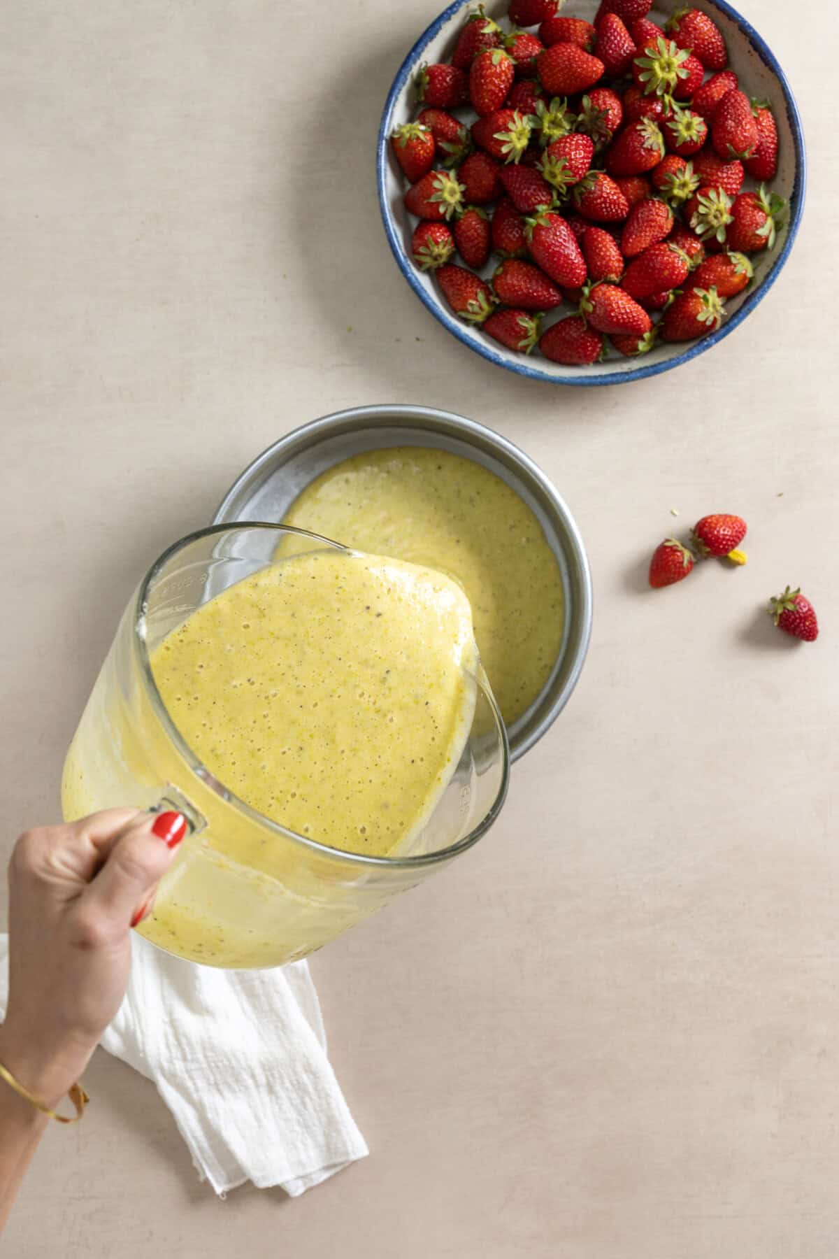 Pouring Olive Oil Cake batter