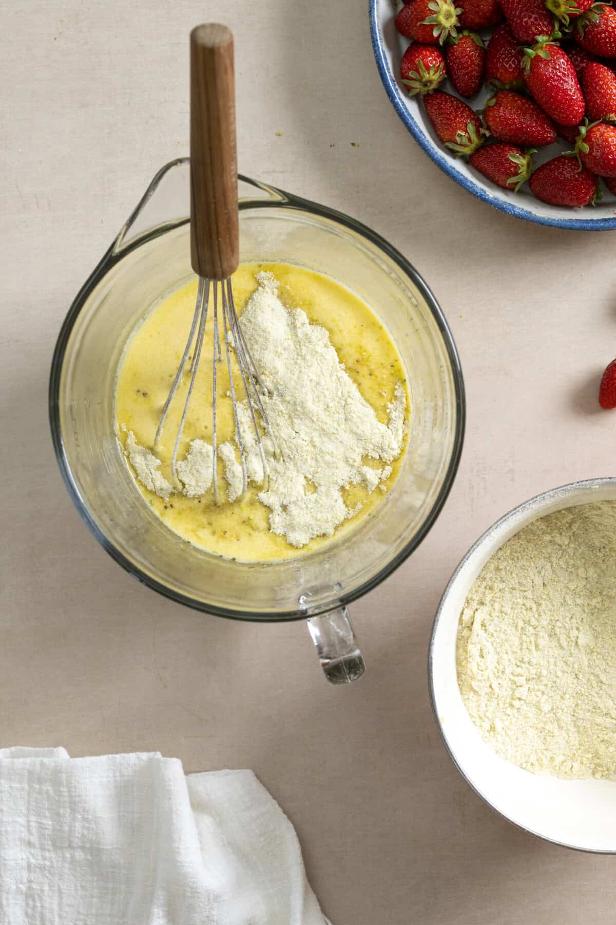 Mixing pistachio olive oil cake batter