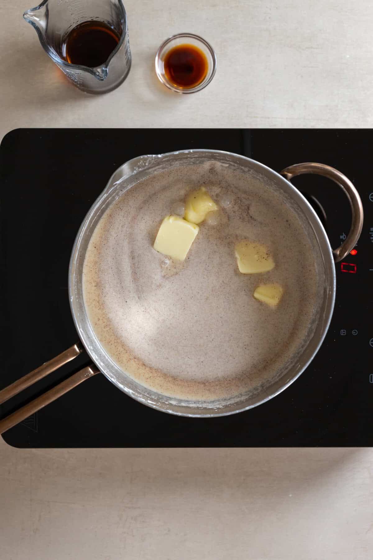 Adding butter to Rum Sugar Pie filling