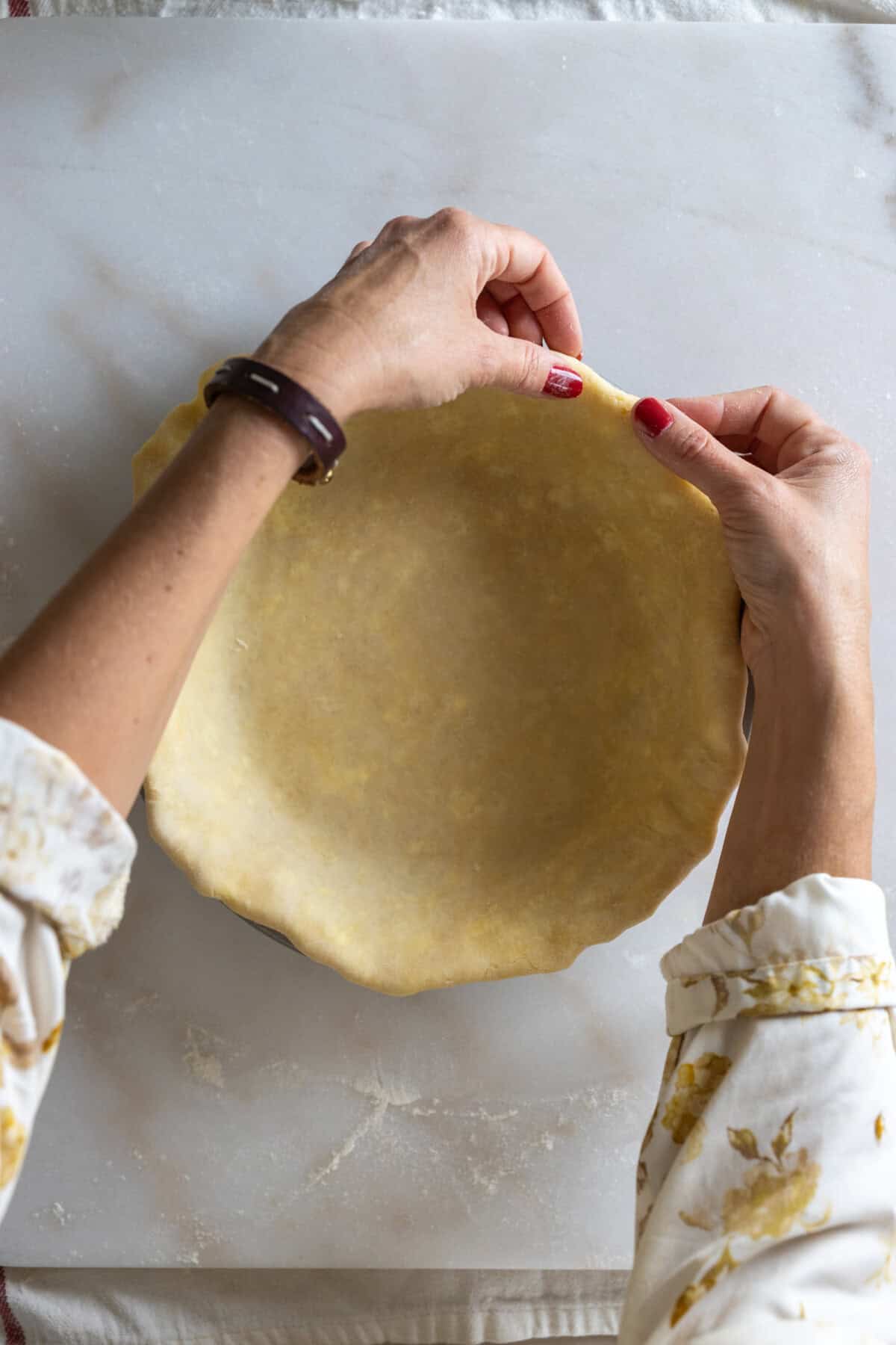 Tucking pie dough edges