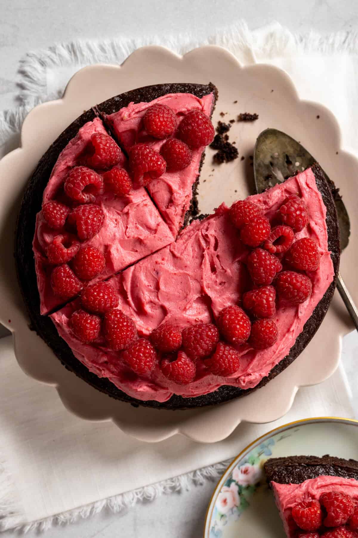 Sliced Chocolate Cake with Raspberry Cream Cheese Frosting