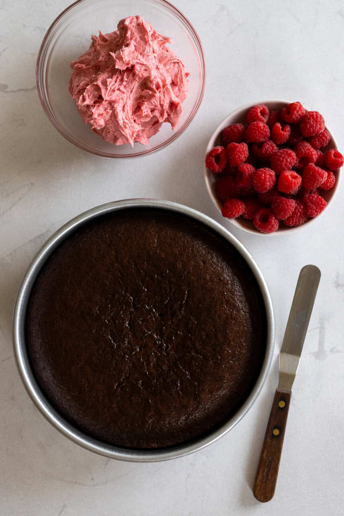 Chocolate Cake with Raspberry Cream Cheese Frosting decorating components