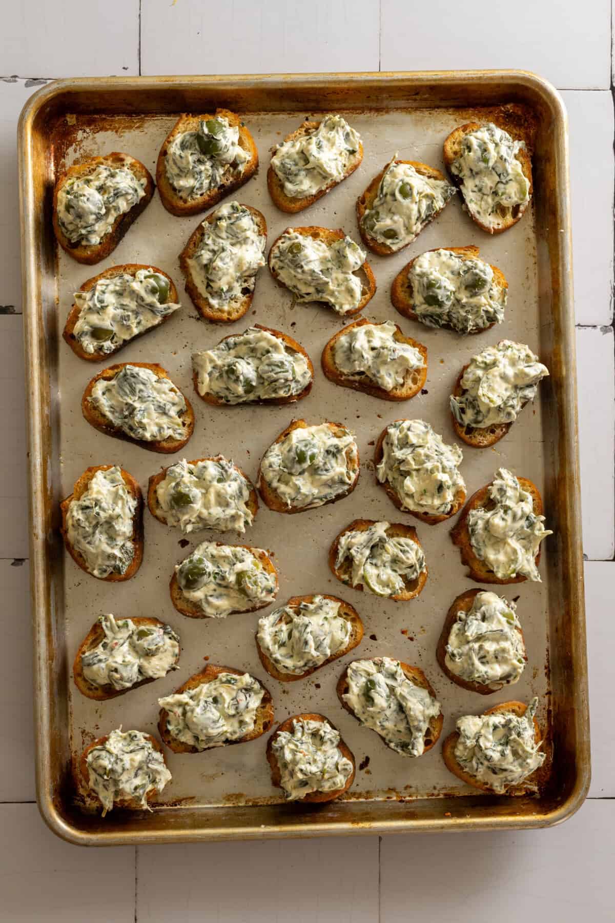 Spinach Olive Dip Crostini pre-baked