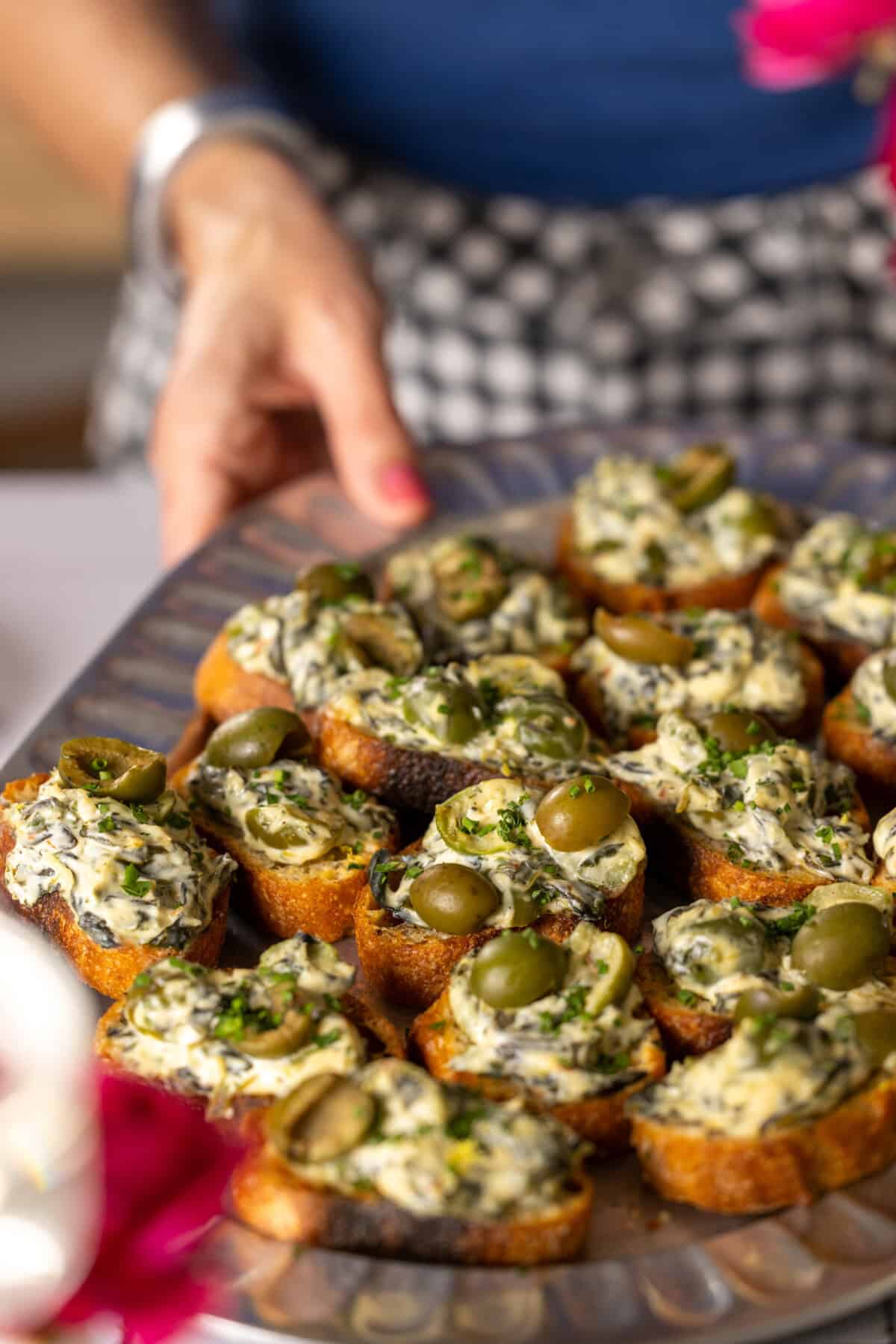Serving Spinach Olive Dip Crostini