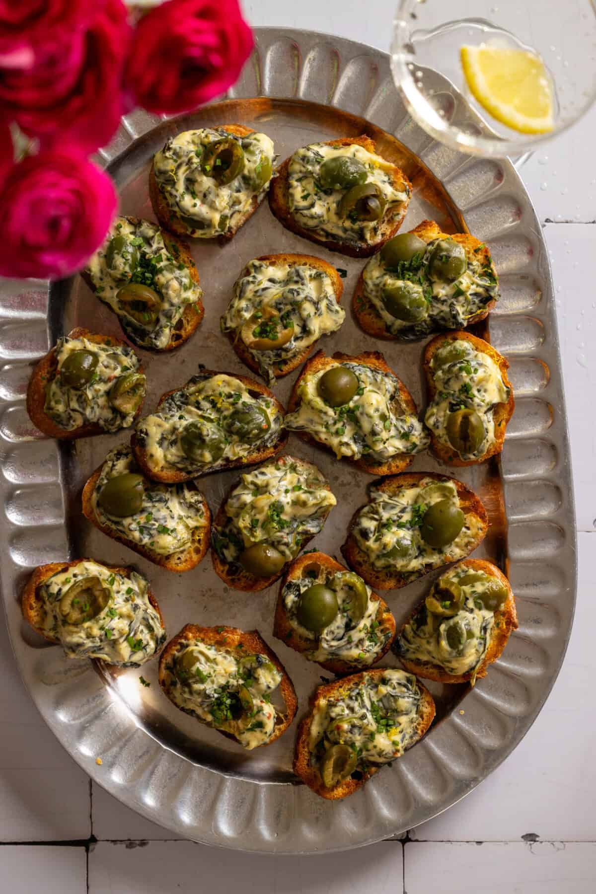 Spinach Olive Dip Crostini recipe by Baking The Goods